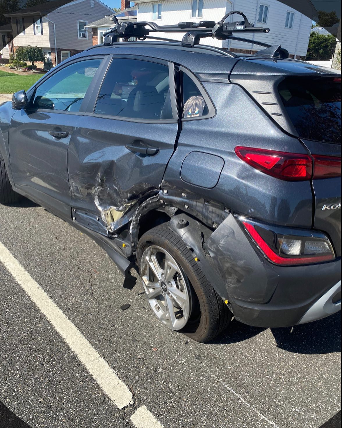 Hyundai Kona before repair with heavy rear side collision damage